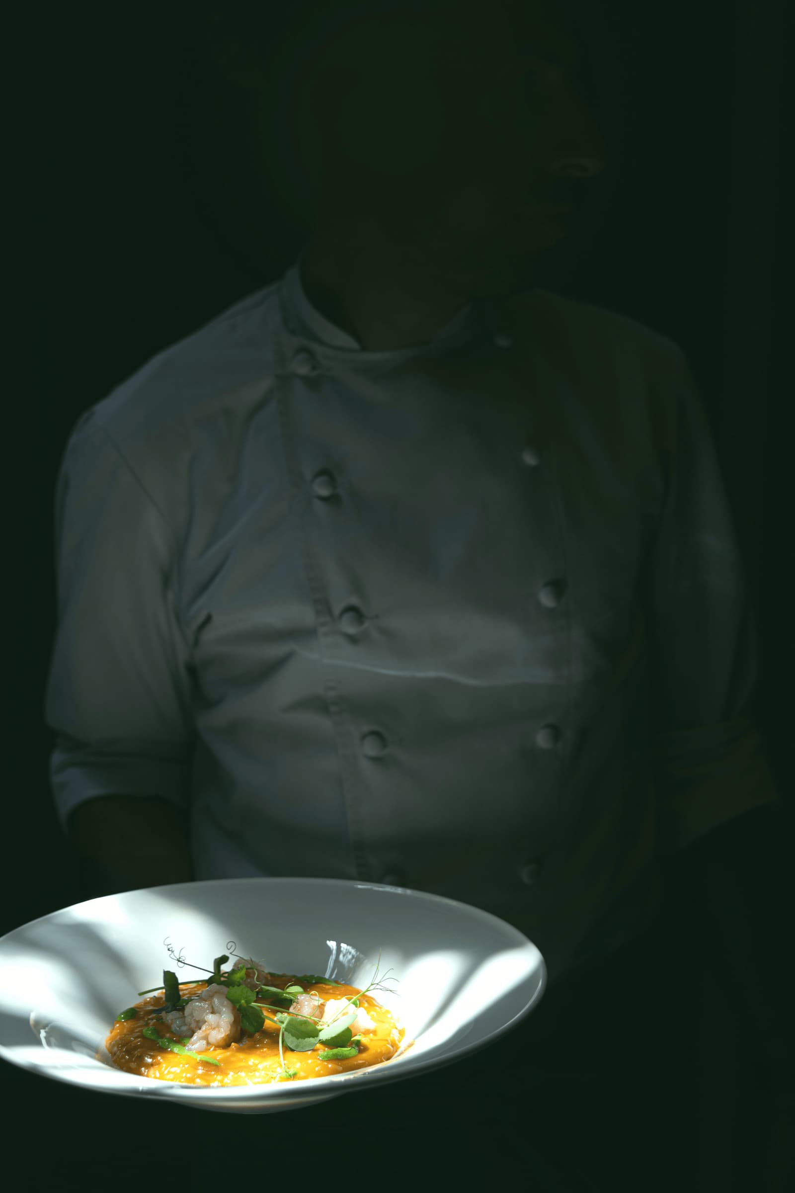 Leander Mena — Miami hospitality operations leader overseeing a restaurant floor